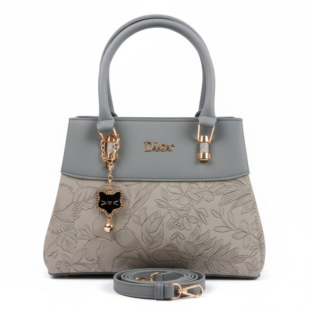 two-tone floral embossed satchel with cat charm