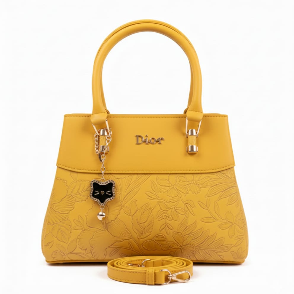 two-tone floral embossed satchel with cat charm