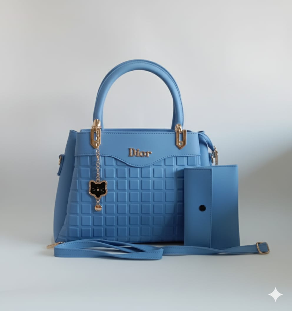 cerulean blue and pink textured top handle bag with wallet companion